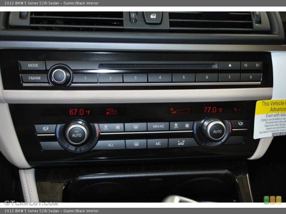 Oyster/Black Interior Controls for the 2013 BMW 5 Series 528i Sedan #73938533