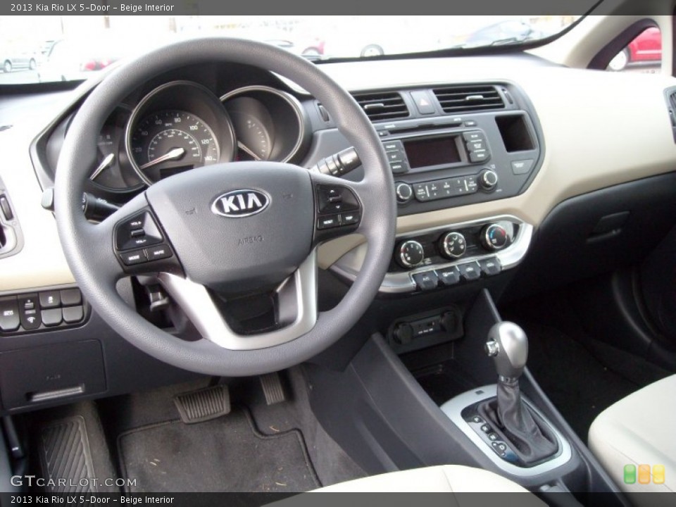 Beige Interior Dashboard for the 2013 Kia Rio LX 5-Door #73963013