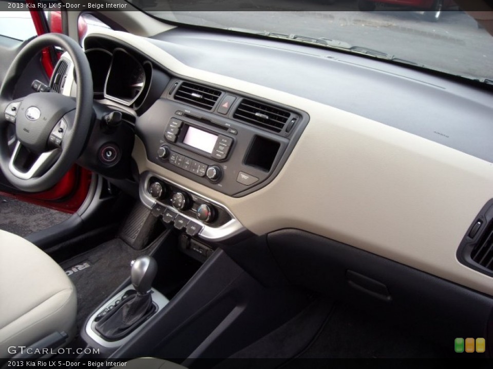 Beige Interior Dashboard for the 2013 Kia Rio LX 5-Door #73963071