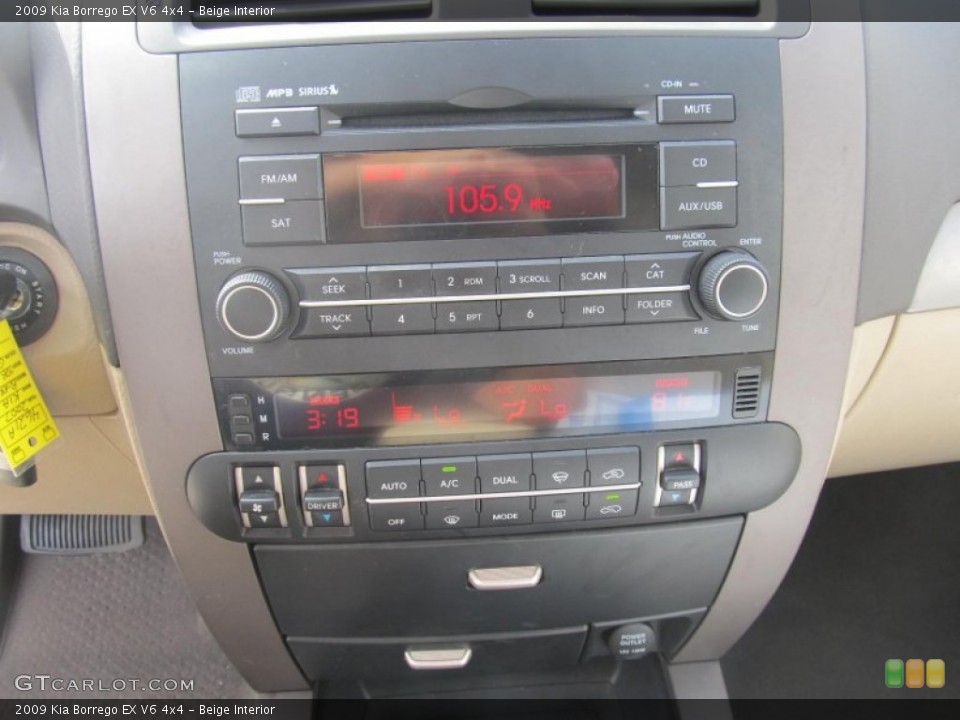 Beige Interior Controls for the 2009 Kia Borrego EX V6 4x4 #73970690