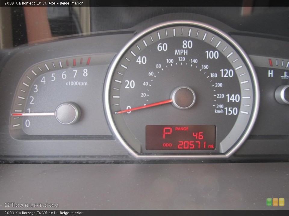 Beige Interior Gauges for the 2009 Kia Borrego EX V6 4x4 #73970744