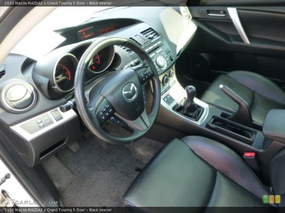 Black Interior Prime Interior for the 2010 Mazda MAZDA3 s Grand Touring 5 Door #73972934