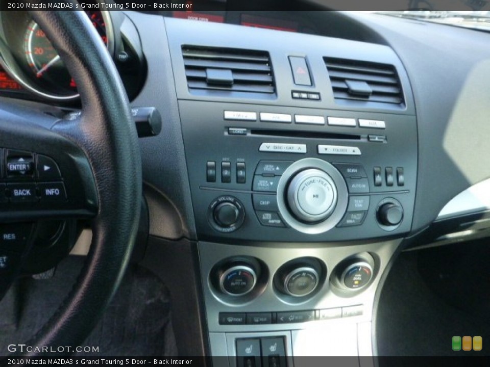 Black Interior Controls for the 2010 Mazda MAZDA3 s Grand Touring 5 Door #73972970