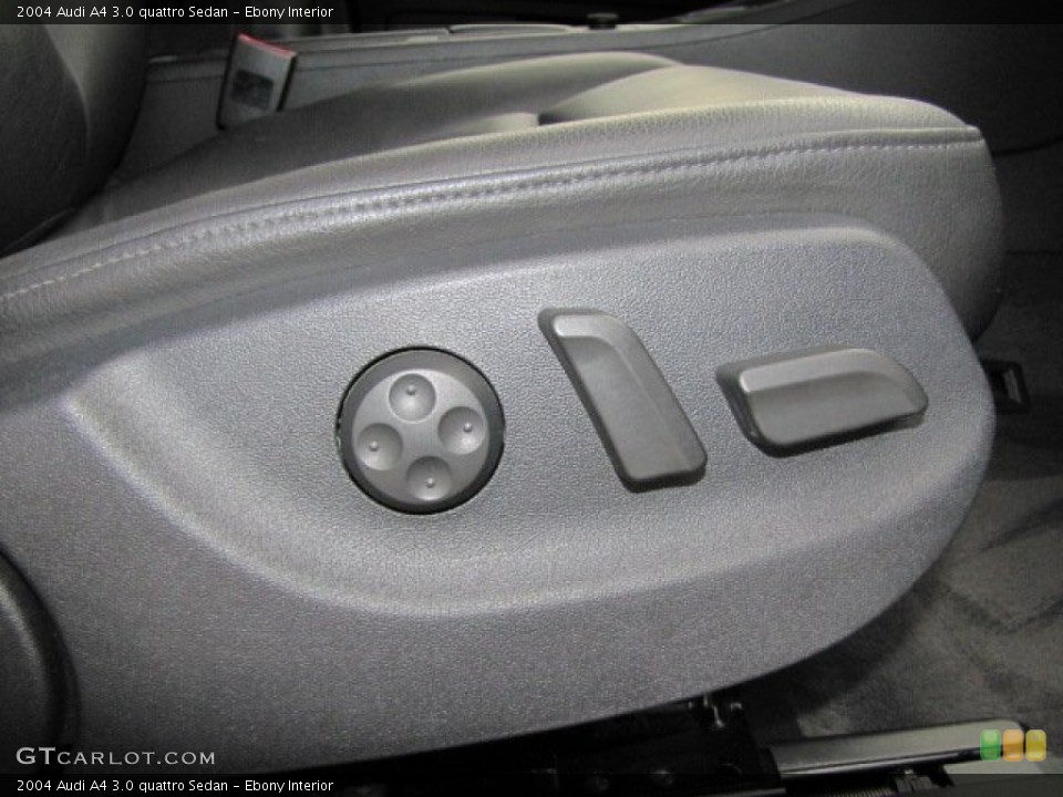 Ebony Interior Controls for the 2004 Audi A4 3.0 quattro Sedan #73976327