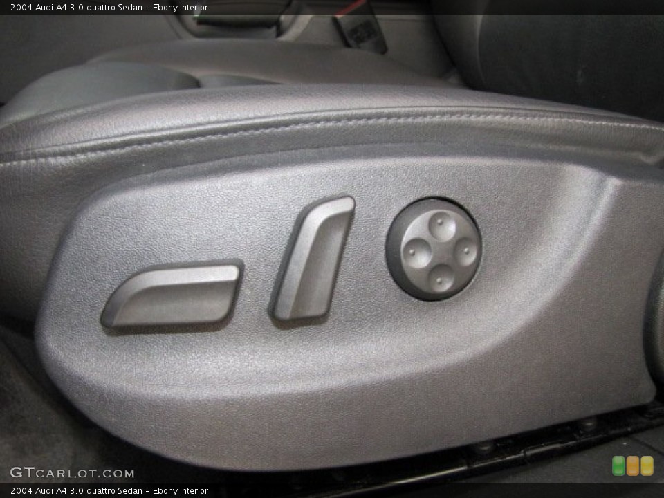 Ebony Interior Controls for the 2004 Audi A4 3.0 quattro Sedan #73976435