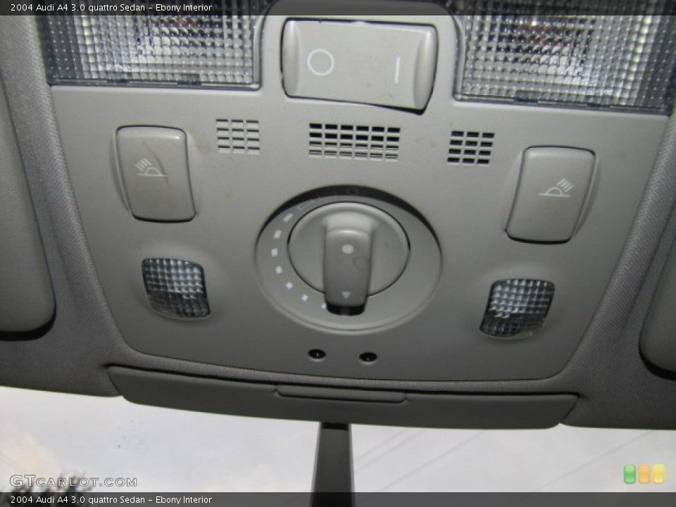 Ebony Interior Controls for the 2004 Audi A4 3.0 quattro Sedan #73976458