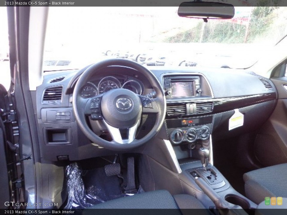 Black Interior Dashboard for the 2013 Mazda CX-5 Sport #74002897