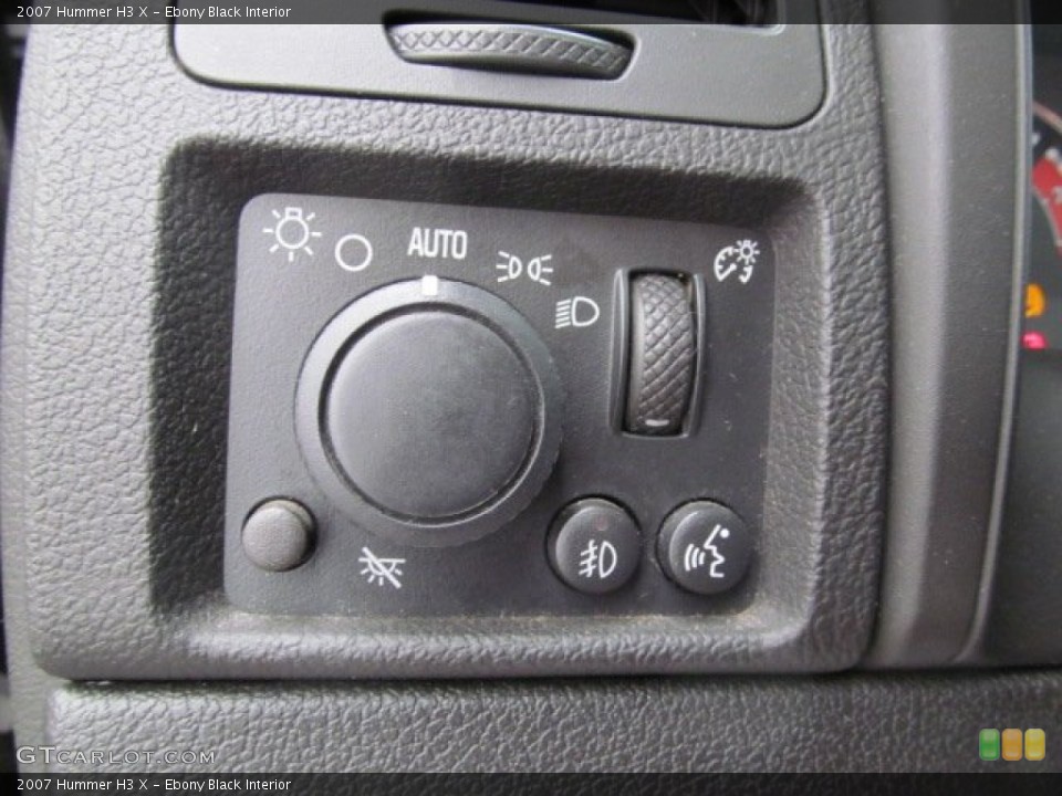 Ebony Black Interior Controls for the 2007 Hummer H3 X #74022735