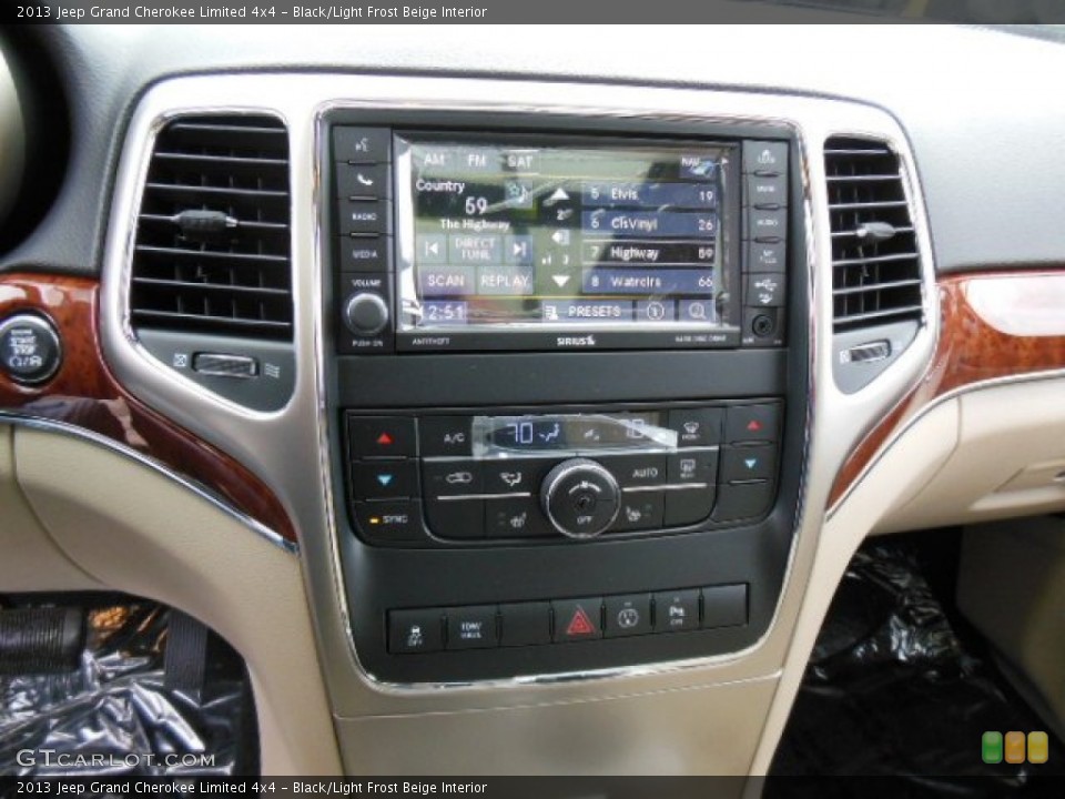 Black/Light Frost Beige Interior Controls for the 2013 Jeep Grand Cherokee Limited 4x4 #74023935