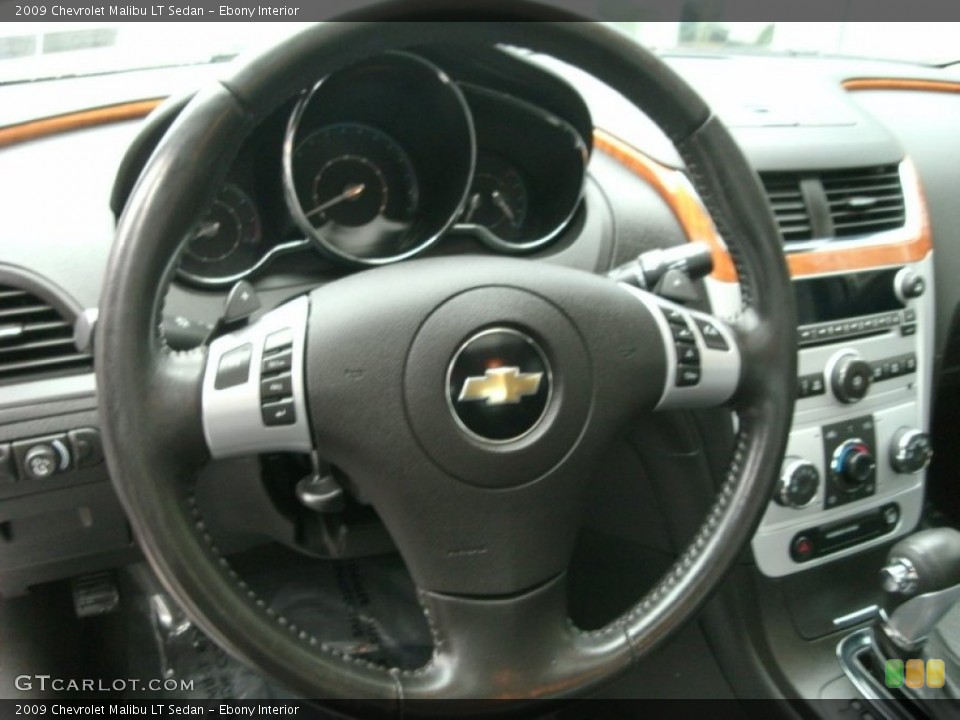Ebony Interior Steering Wheel for the 2009 Chevrolet Malibu LT Sedan #74029907