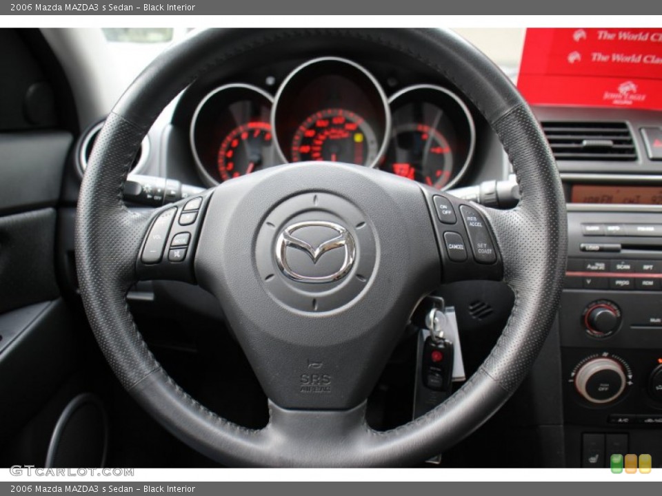 Black Interior Steering Wheel for the 2006 Mazda MAZDA3 s Sedan #74034408