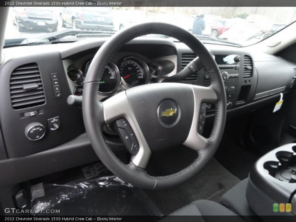 Ebony Interior Steering Wheel for the 2013 Chevrolet Silverado 1500 Hybrid Crew Cab #74034627