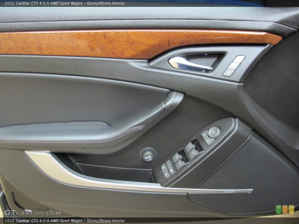 Ebony/Ebony Interior Door Panel for the 2012 Cadillac CTS 4 3.0 AWD Sport Wagon #74055638