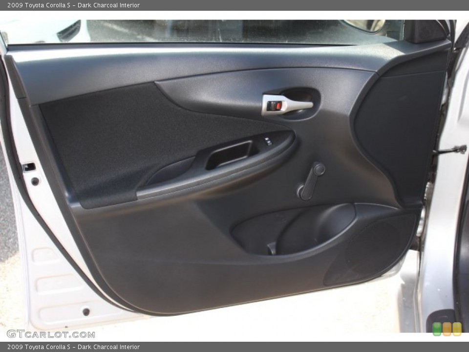 Dark Charcoal Interior Door Panel for the 2009 Toyota Corolla S #74080145