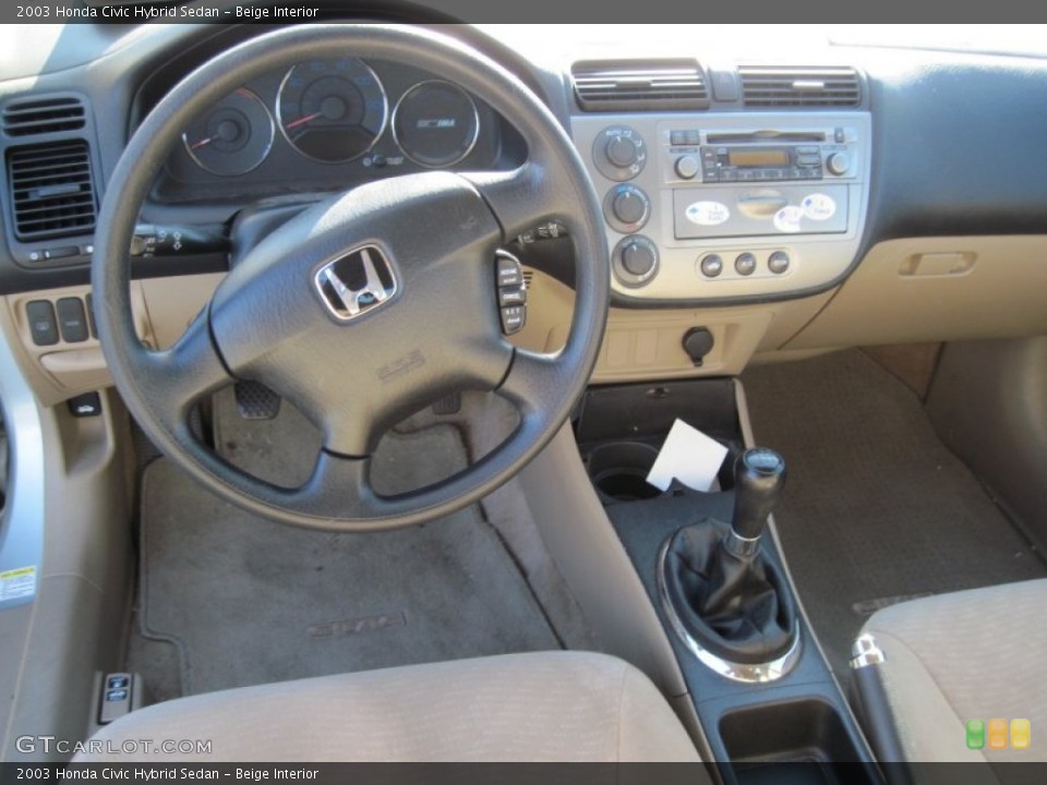 Beige Interior Dashboard for the 2003 Honda Civic Hybrid Sedan #74090636
