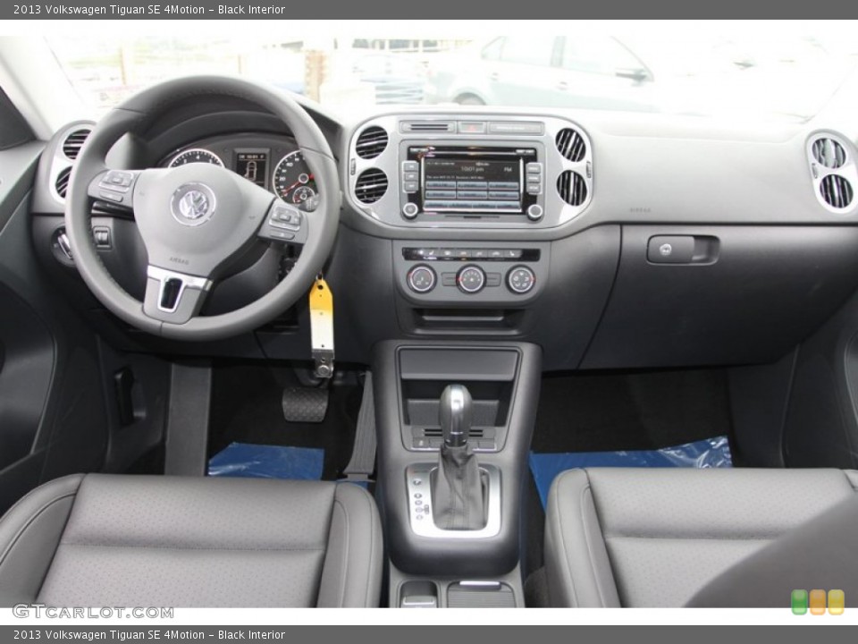 Black Interior Dashboard for the 2013 Volkswagen Tiguan SE 4Motion #74120722