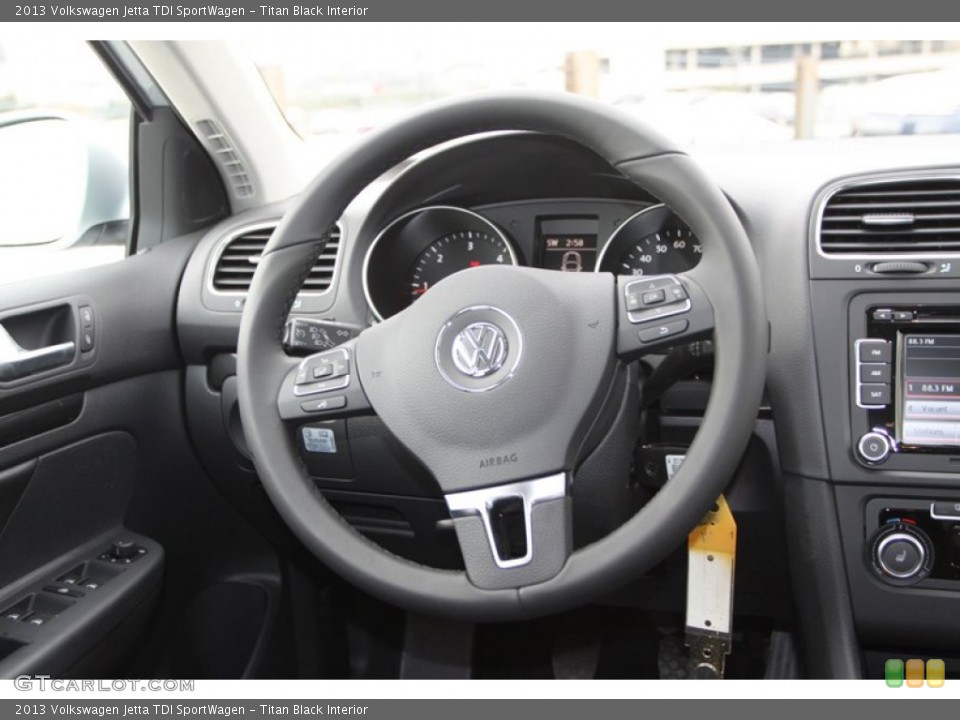 Titan Black Interior Steering Wheel for the 2013 Volkswagen Jetta TDI SportWagen #74121913