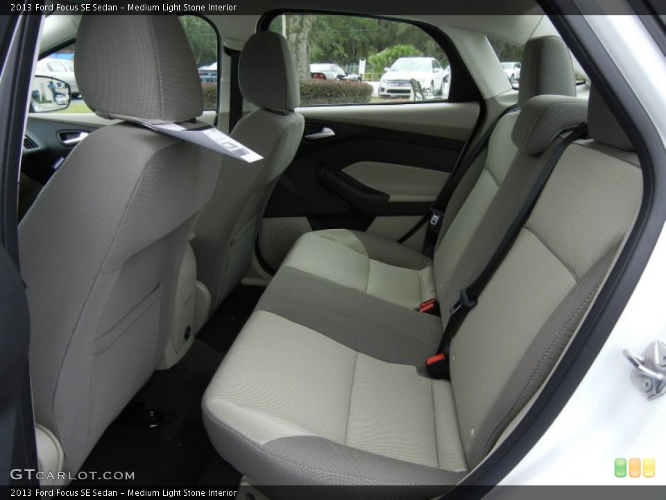 Medium Light Stone Interior Rear Seat for the 2013 Ford Focus SE Sedan #74138047