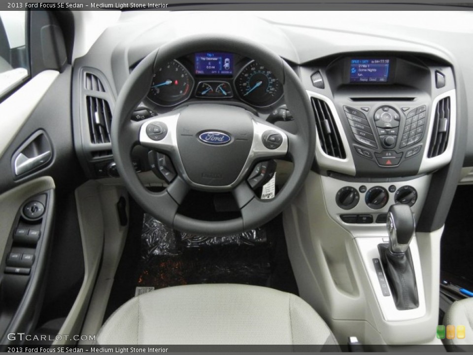 Medium Light Stone Interior Dashboard for the 2013 Ford Focus SE Sedan #74138066