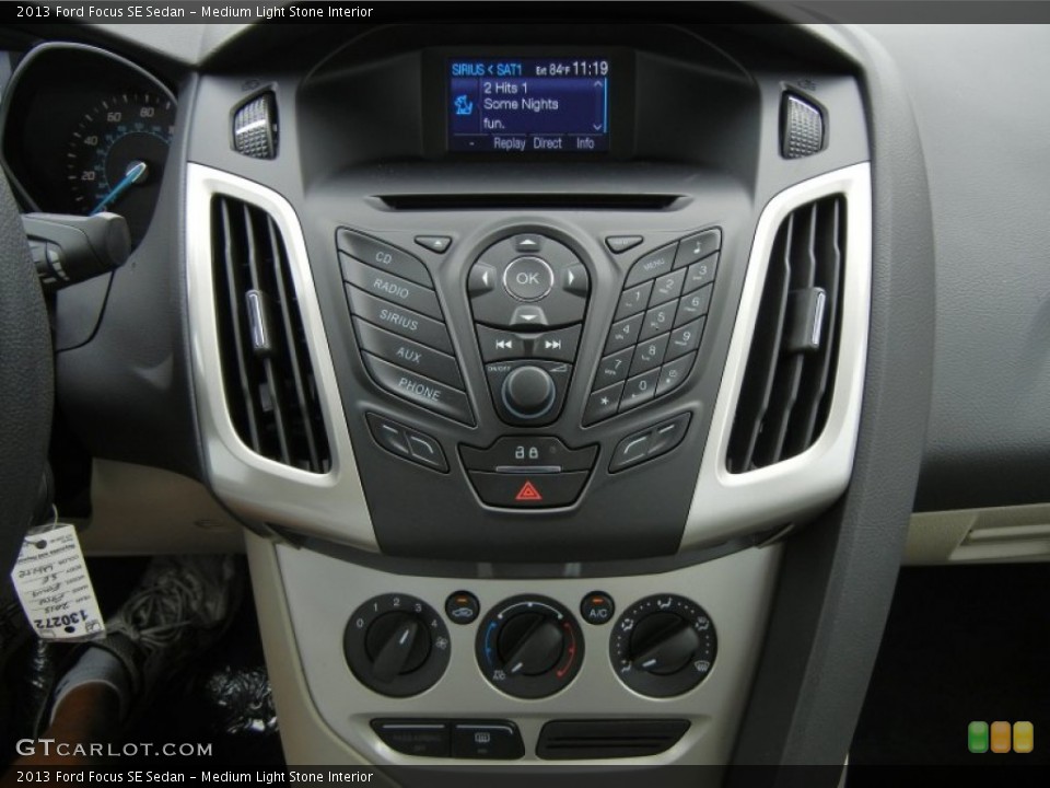 Medium Light Stone Interior Controls for the 2013 Ford Focus SE Sedan #74138116
