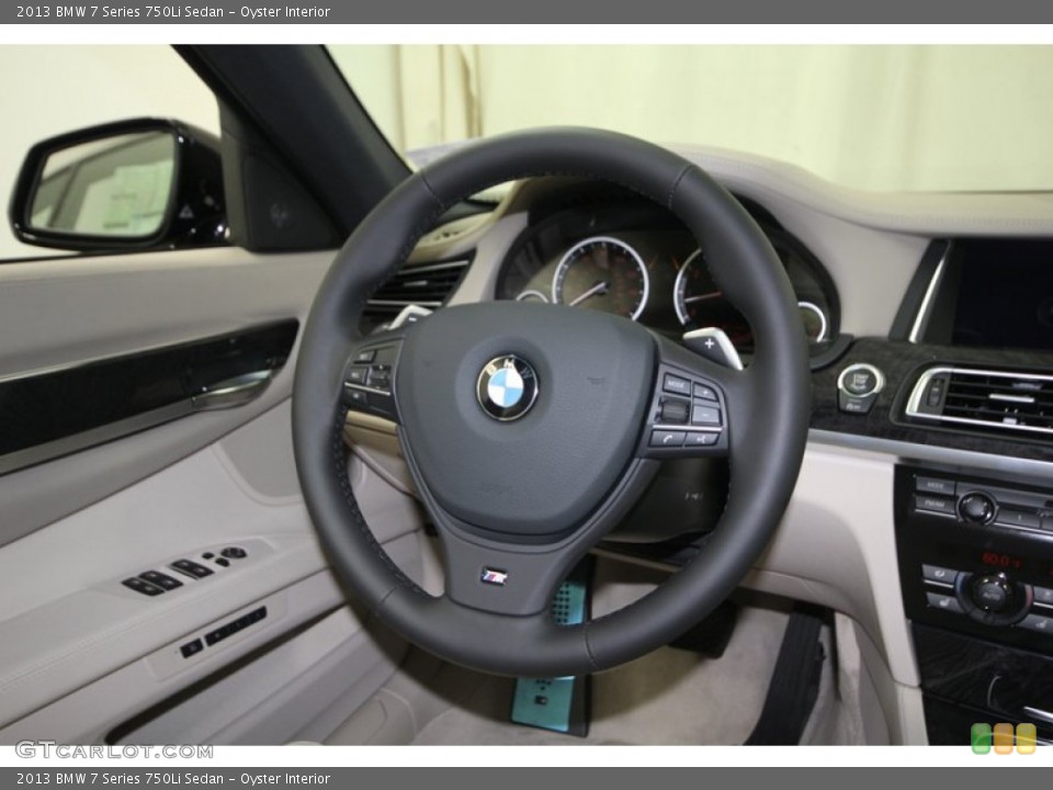 Oyster Interior Steering Wheel for the 2013 BMW 7 Series 750Li Sedan #74147296