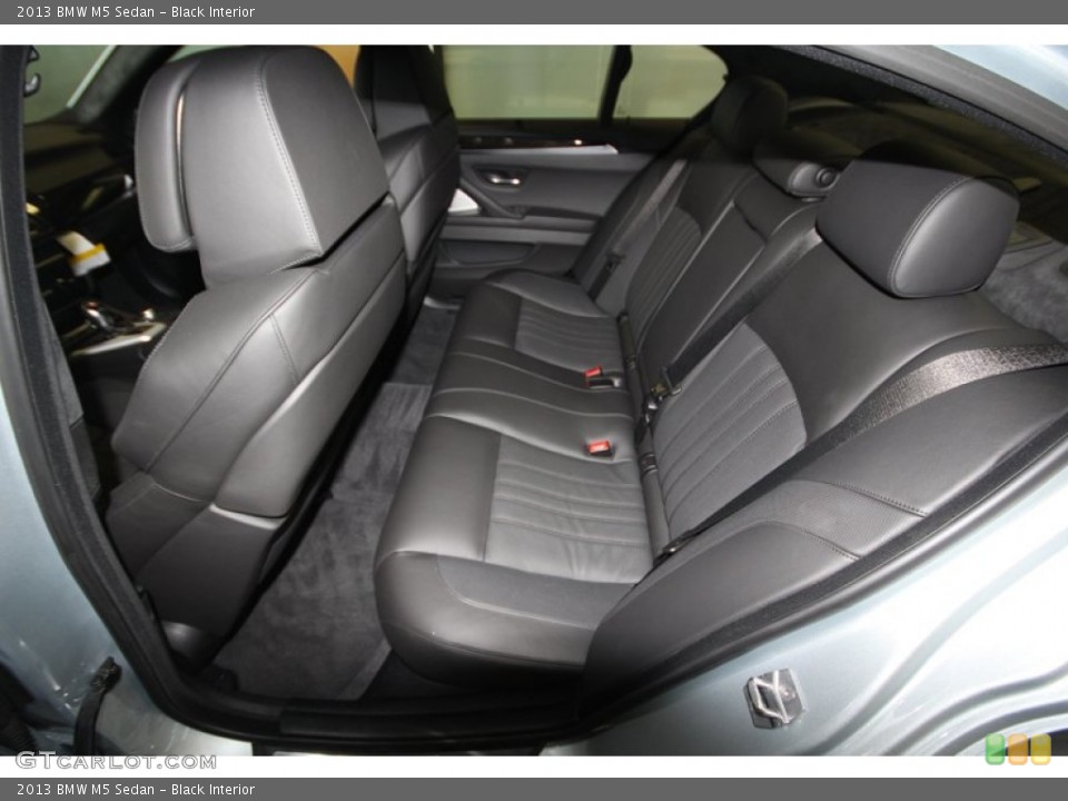 Black Interior Rear Seat for the 2013 BMW M5 Sedan #74147578