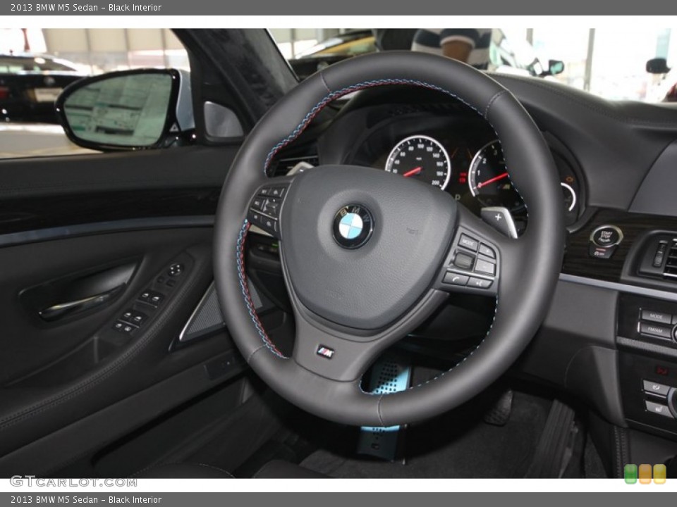 Black Interior Steering Wheel for the 2013 BMW M5 Sedan #74147881