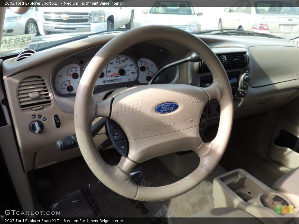 Medium Parchment Beige Interior Steering Wheel for the 2003 Ford Explorer Sport XLT #74170752