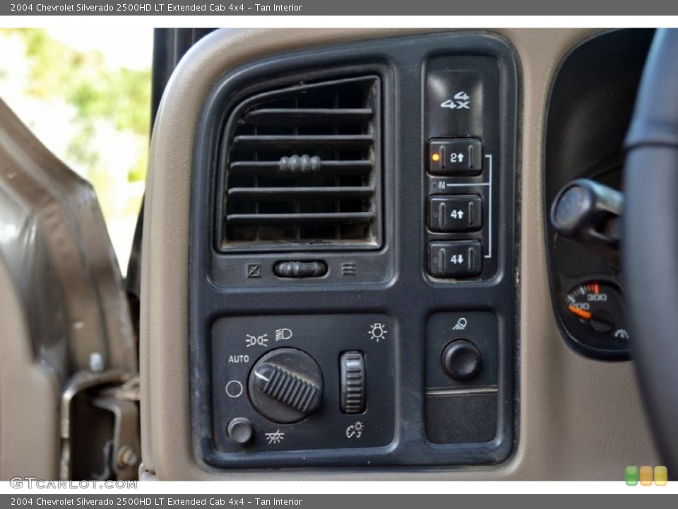Tan Interior Controls for the 2004 Chevrolet Silverado 2500HD LT Extended Cab 4x4 #74237027