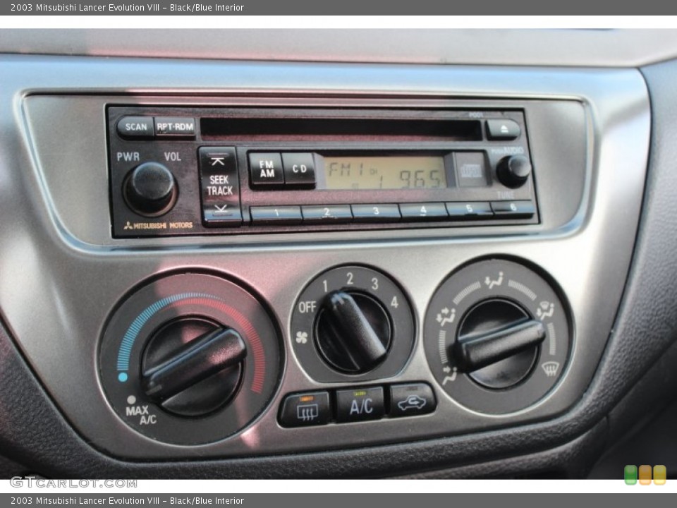 Black/Blue Interior Controls for the 2003 Mitsubishi Lancer Evolution VIII #74238671
