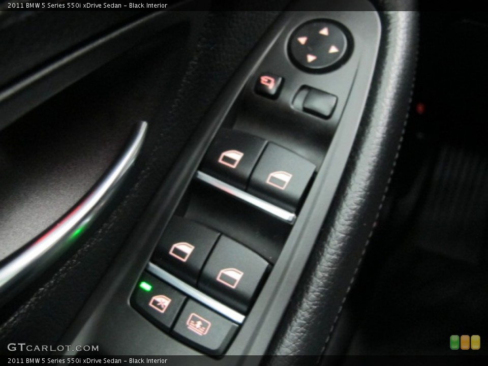 Black Interior Controls for the 2011 BMW 5 Series 550i xDrive Sedan #74242733