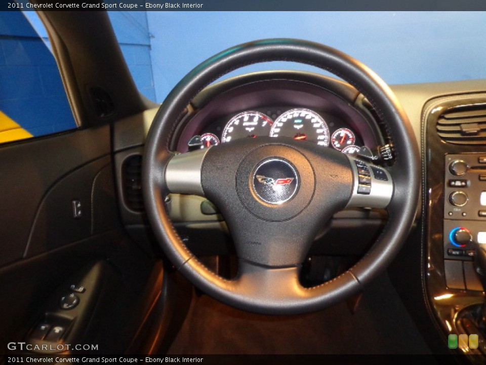Ebony Black Interior Steering Wheel for the 2011 Chevrolet Corvette Grand Sport Coupe #74254390