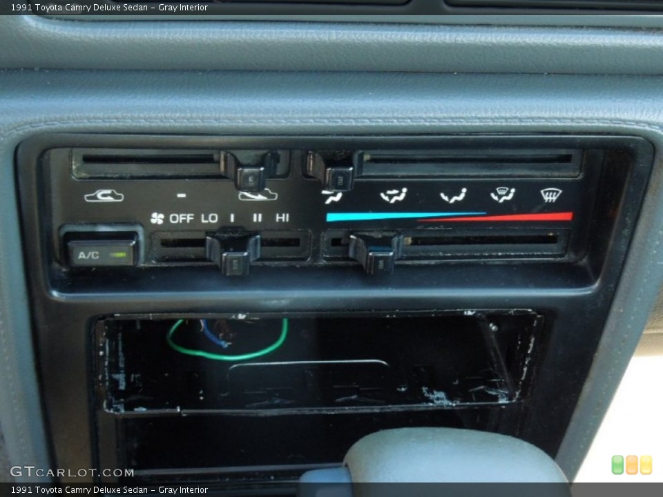 Gray Interior Controls for the 1991 Toyota Camry Deluxe Sedan #74265802