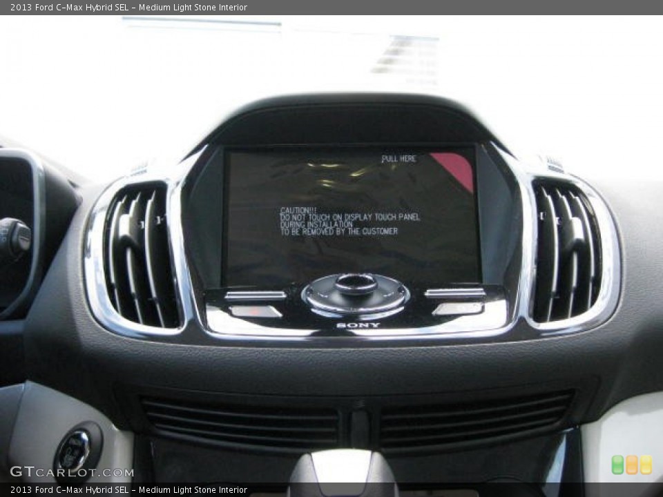 Medium Light Stone Interior Controls for the 2013 Ford C-Max Hybrid SEL #74271241