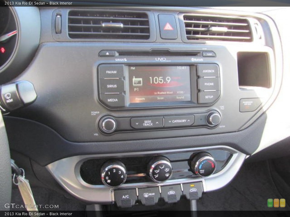 Black Interior Controls for the 2013 Kia Rio EX Sedan #74314888