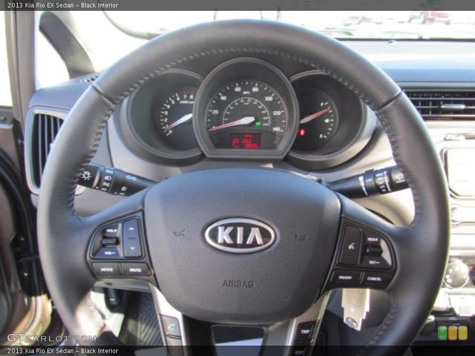 Black Interior Steering Wheel for the 2013 Kia Rio EX Sedan #74314949