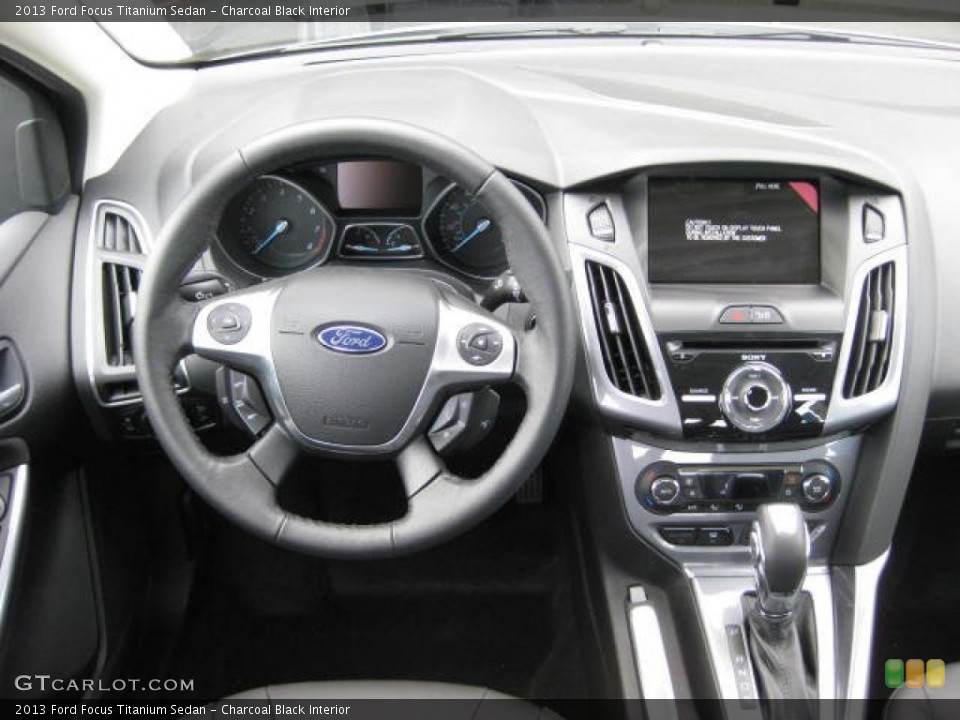 Charcoal Black Interior Dashboard for the 2013 Ford Focus Titanium Sedan #74349859