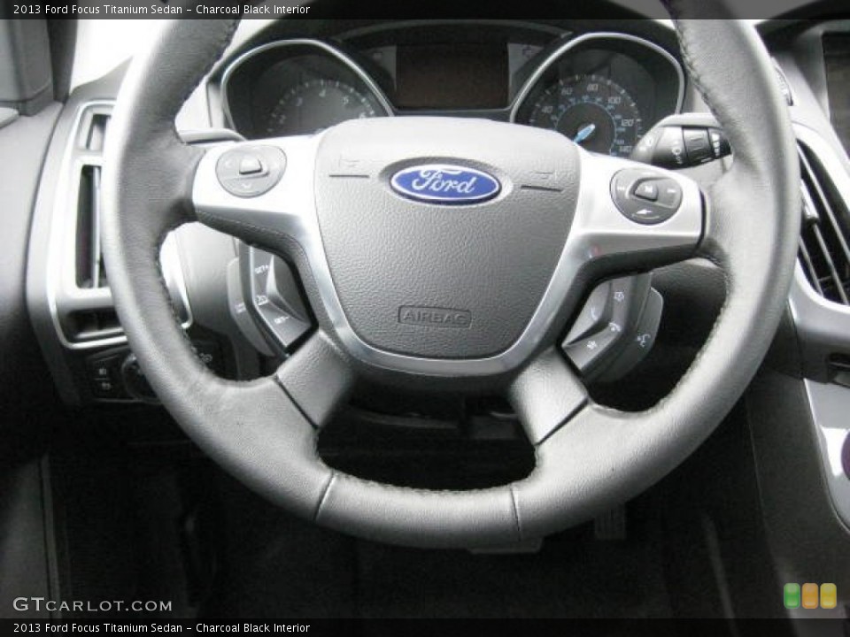 Charcoal Black Interior Steering Wheel for the 2013 Ford Focus Titanium Sedan #74349901