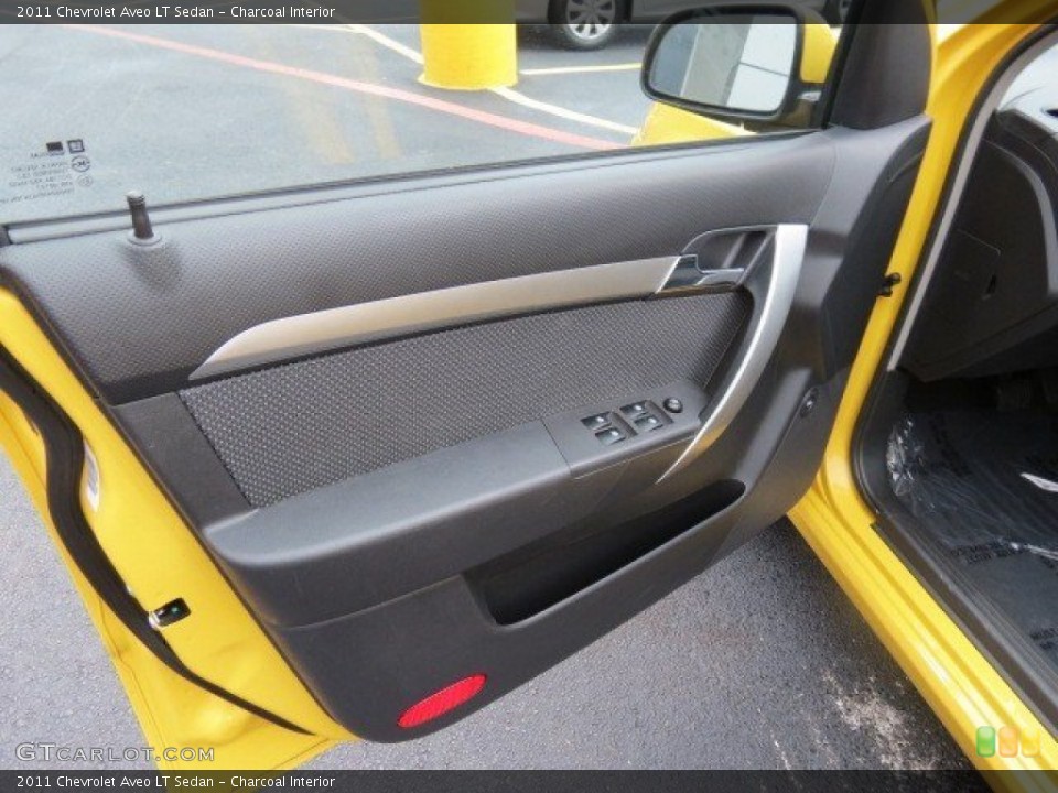 Charcoal Interior Door Panel for the 2011 Chevrolet Aveo LT Sedan #74355719