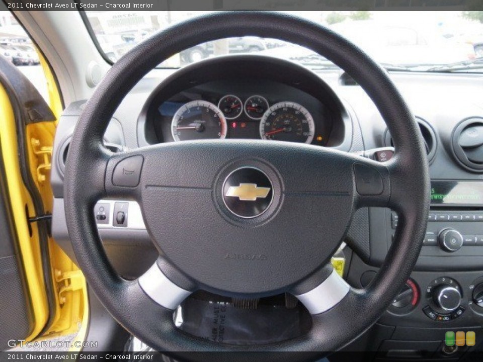 Charcoal Interior Steering Wheel for the 2011 Chevrolet Aveo LT Sedan #74355844