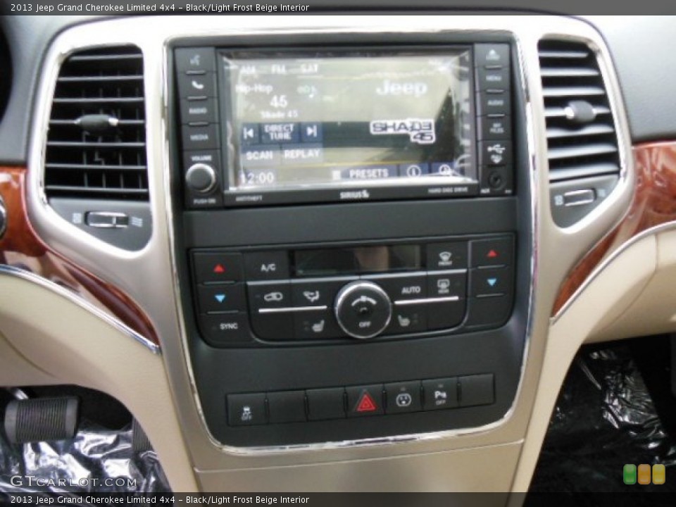 Black/Light Frost Beige Interior Controls for the 2013 Jeep Grand Cherokee Limited 4x4 #74360949