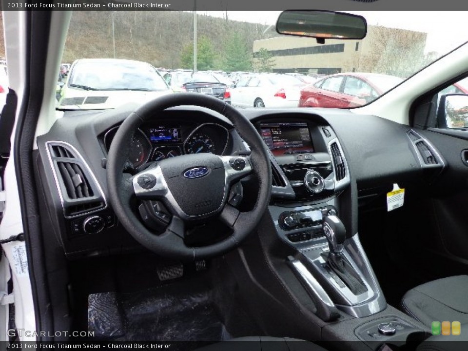 Charcoal Black Interior Dashboard for the 2013 Ford Focus Titanium Sedan #74384362
