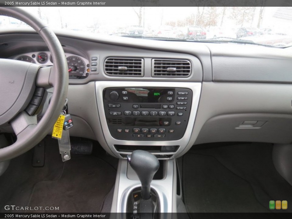 Medium Graphite Interior Dashboard for the 2005 Mercury Sable LS Sedan #74420178