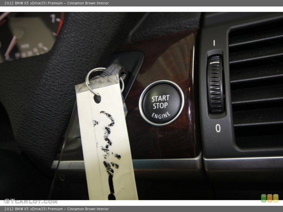 Cinnamon Brown Interior Controls for the 2012 BMW X5 xDrive35i Premium #74432083