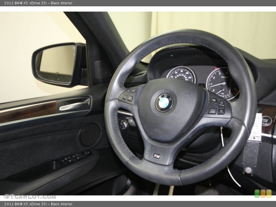 Black Interior Steering Wheel for the 2011 BMW X5 xDrive 35i #74432677