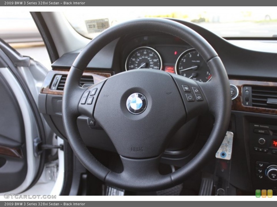 Black Interior Steering Wheel for the 2009 BMW 3 Series 328xi Sedan #74438330