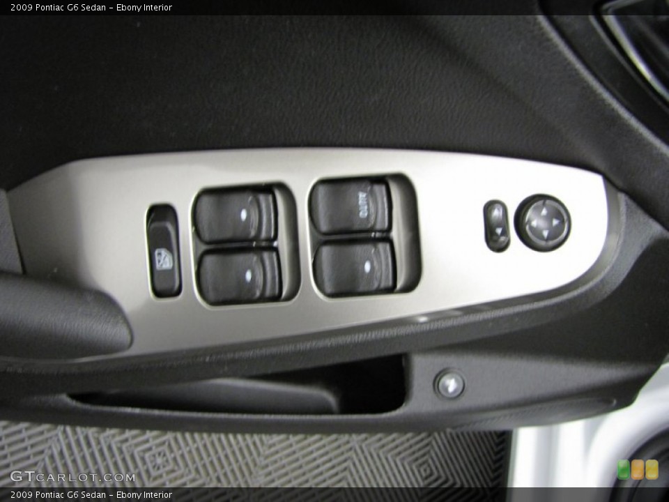 Ebony Interior Controls for the 2009 Pontiac G6 Sedan #74439910