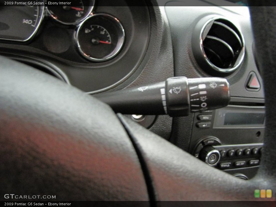 Ebony Interior Controls for the 2009 Pontiac G6 Sedan #74440073