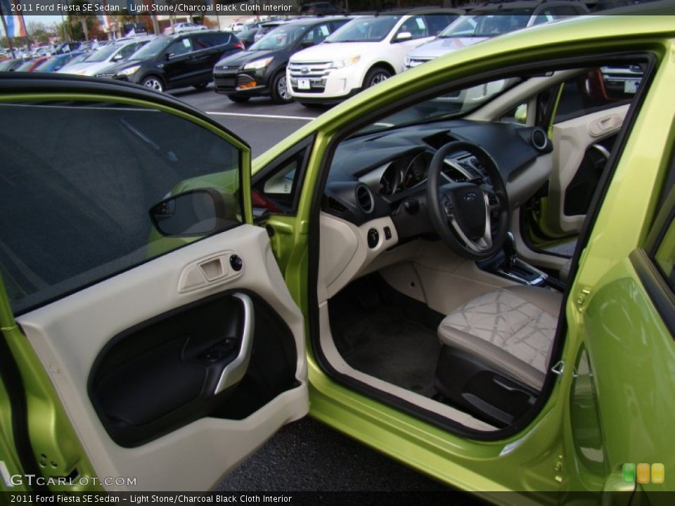 Light Stone/Charcoal Black Cloth Interior Photo for the 2011 Ford Fiesta SE Sedan #74444786