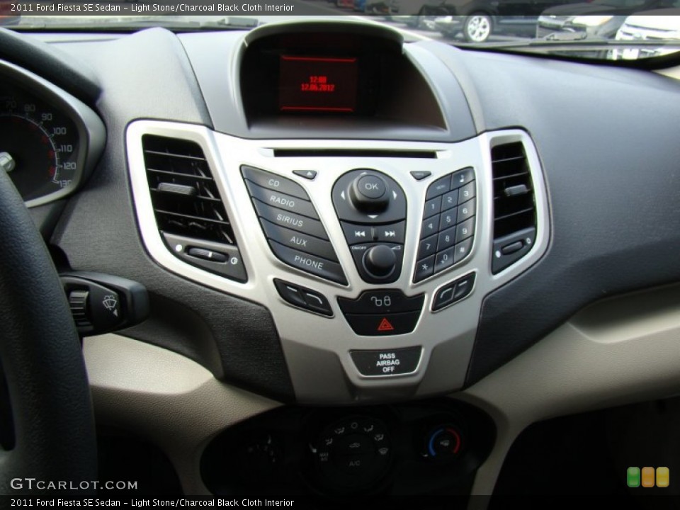 Light Stone/Charcoal Black Cloth Interior Controls for the 2011 Ford Fiesta SE Sedan #74444956